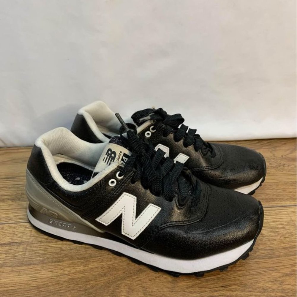 New Balance 574 woman’s size 6.5. Black/white/gray. New condition. Gorgeous!